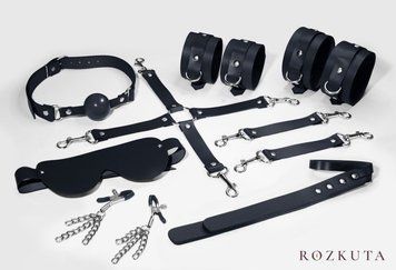 Набір Feral Feelings BDSM Kit 7 Black, наручники, поножі, конектор, маска, падл, кляп, затискачі SO8276 фото